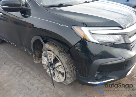 2021 Honda Pilot Awd Touring 8 Passenger z USA, uszkodzony, nr VIN 5FNYF6H91MB077927